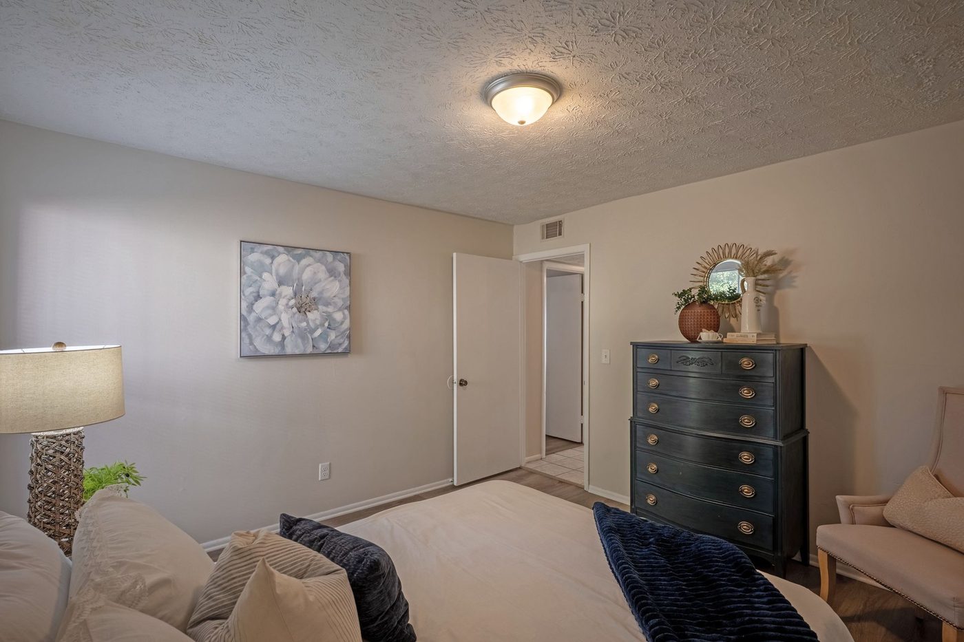 Bedroom in a renovated Grand Oaks apartment